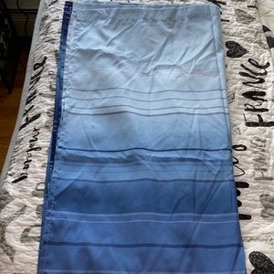 Beautiful blue shower curtain.